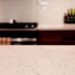 Clay Kitchen Remodel cherry distressed base cabinets and white upper cabinets