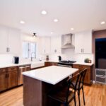 Clay Kitchen Remodel cherry distressed base cabinets and white upper cabinets