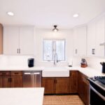 Clay Kitchen Remodel cherry distressed base cabinets and white upper cabinets