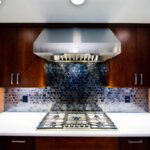 Liverpool NY kitchen remodel with custom beverage center and dark wood cabinetry