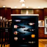 Liverpool NY kitchen remodel with custom beverage center and dark wood cabinetry