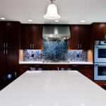 Liverpool NY kitchen remodel with custom beverage center and dark wood cabinetry