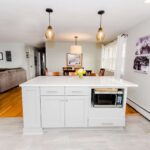 Manlius NY kitchen remodel with wall removed to create an open kitchen with large island